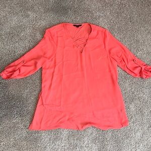 Orange flowy blouse
